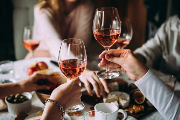 Glasses of rose wine seen during a friendly party of a celebration.