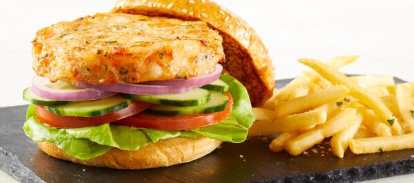 Premium Shrimp Burger on bun with fries