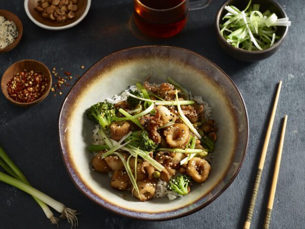 General Tso's Calamari with toppings and chopsticks