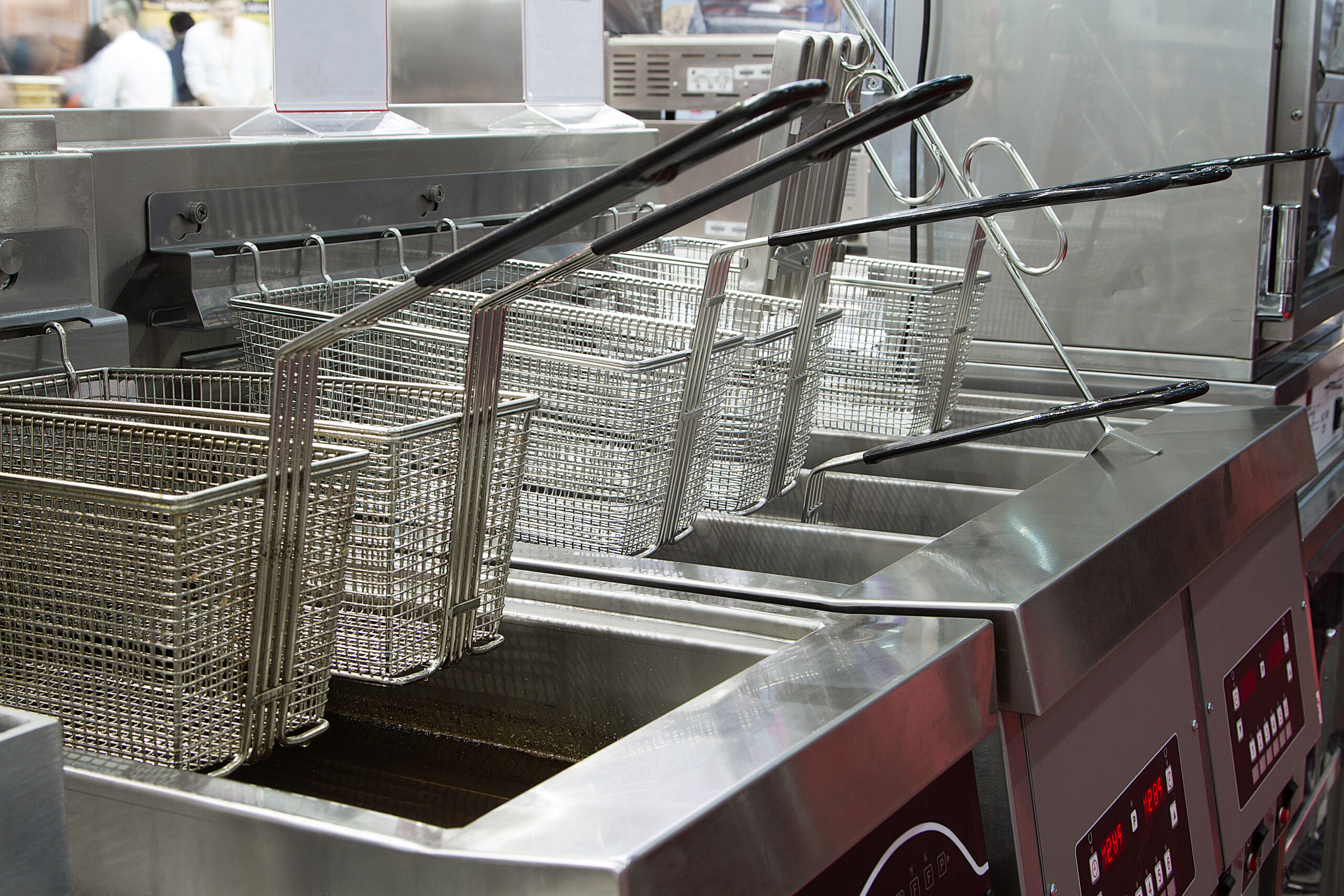 Industrial deep fryers in a commercial kitchen